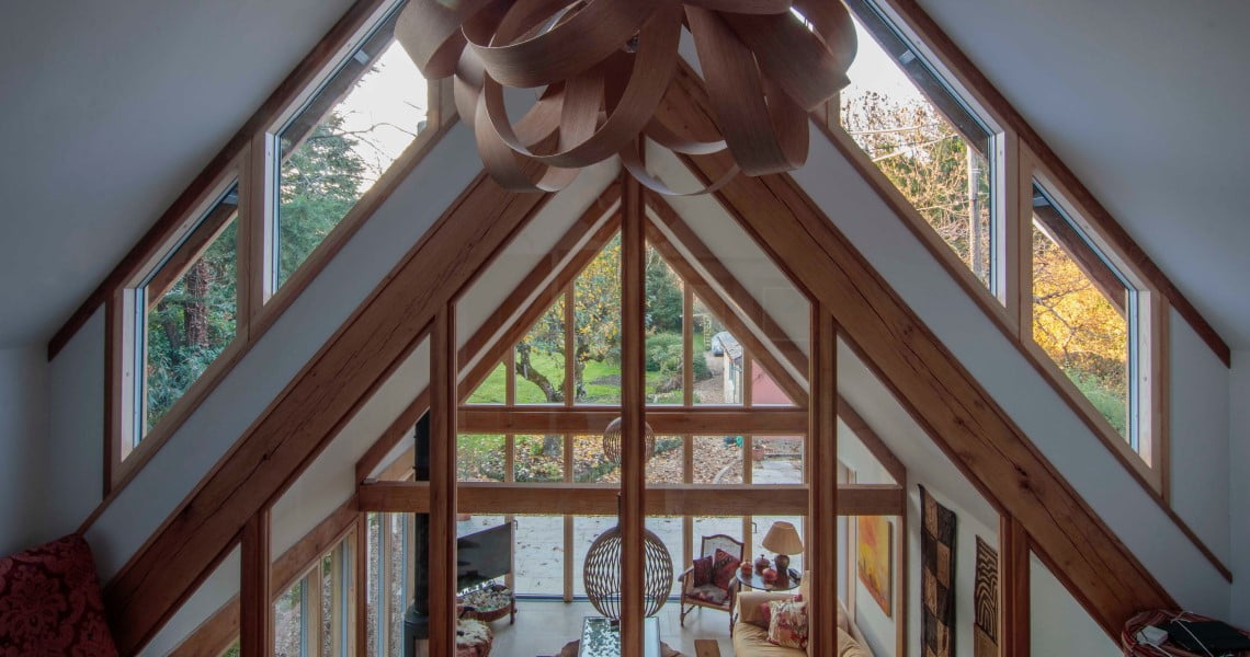 Arched wooden ceiling with view into garden